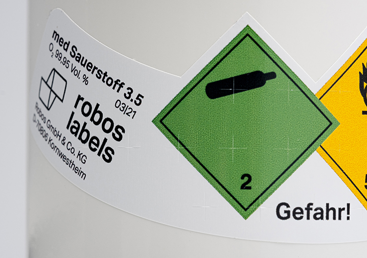 Ein übertragungssicheres Etikett auf einer Sauerstoff-Druckflasche